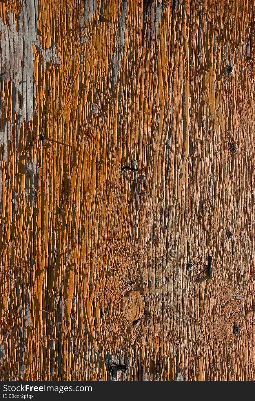 Old red painted wooden plank.