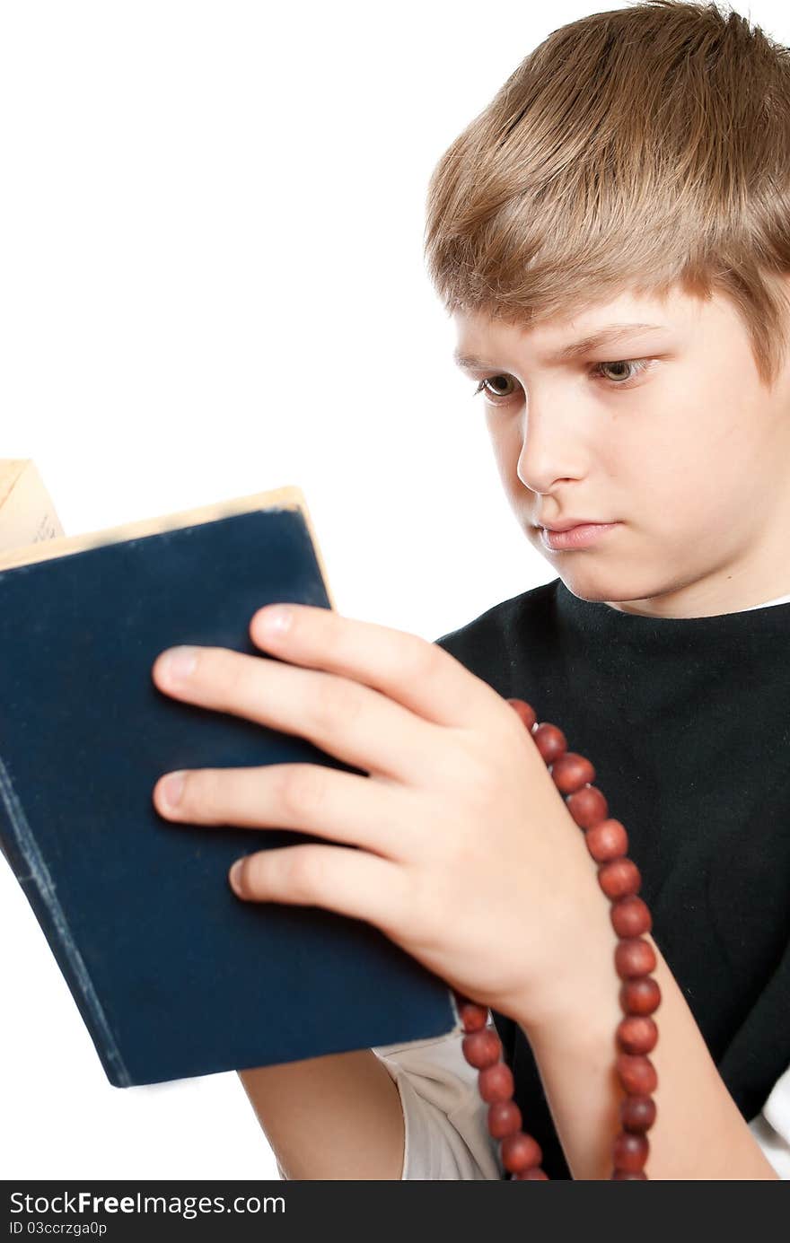 The child reads the Bible.