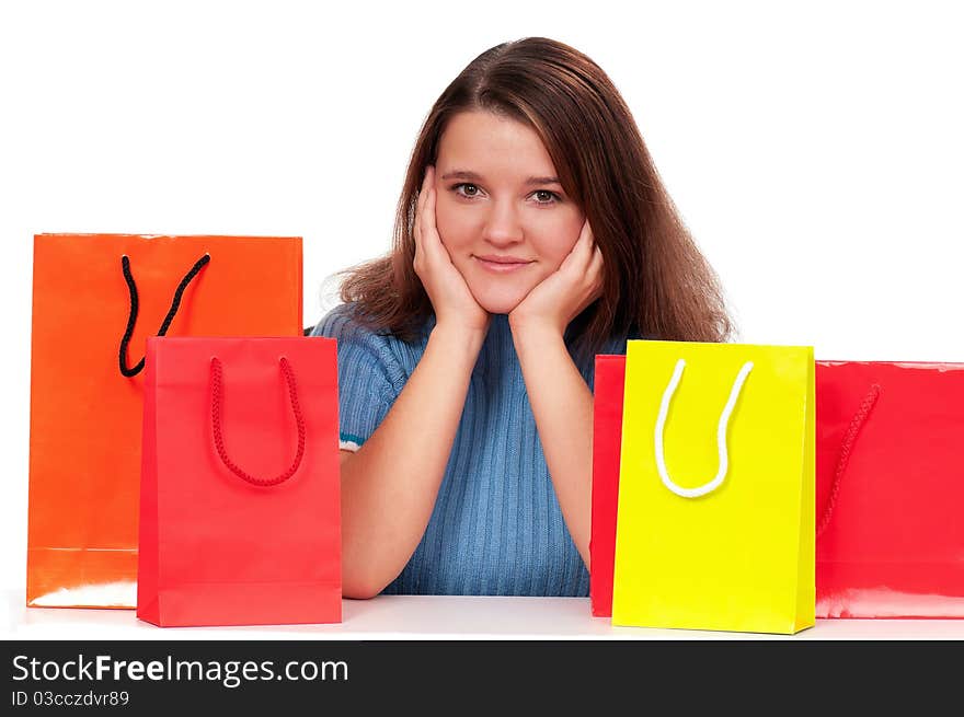 Portrait of beautiful girl with shopping bags