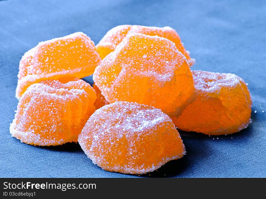 Group of Jujube in sugar. Macro.