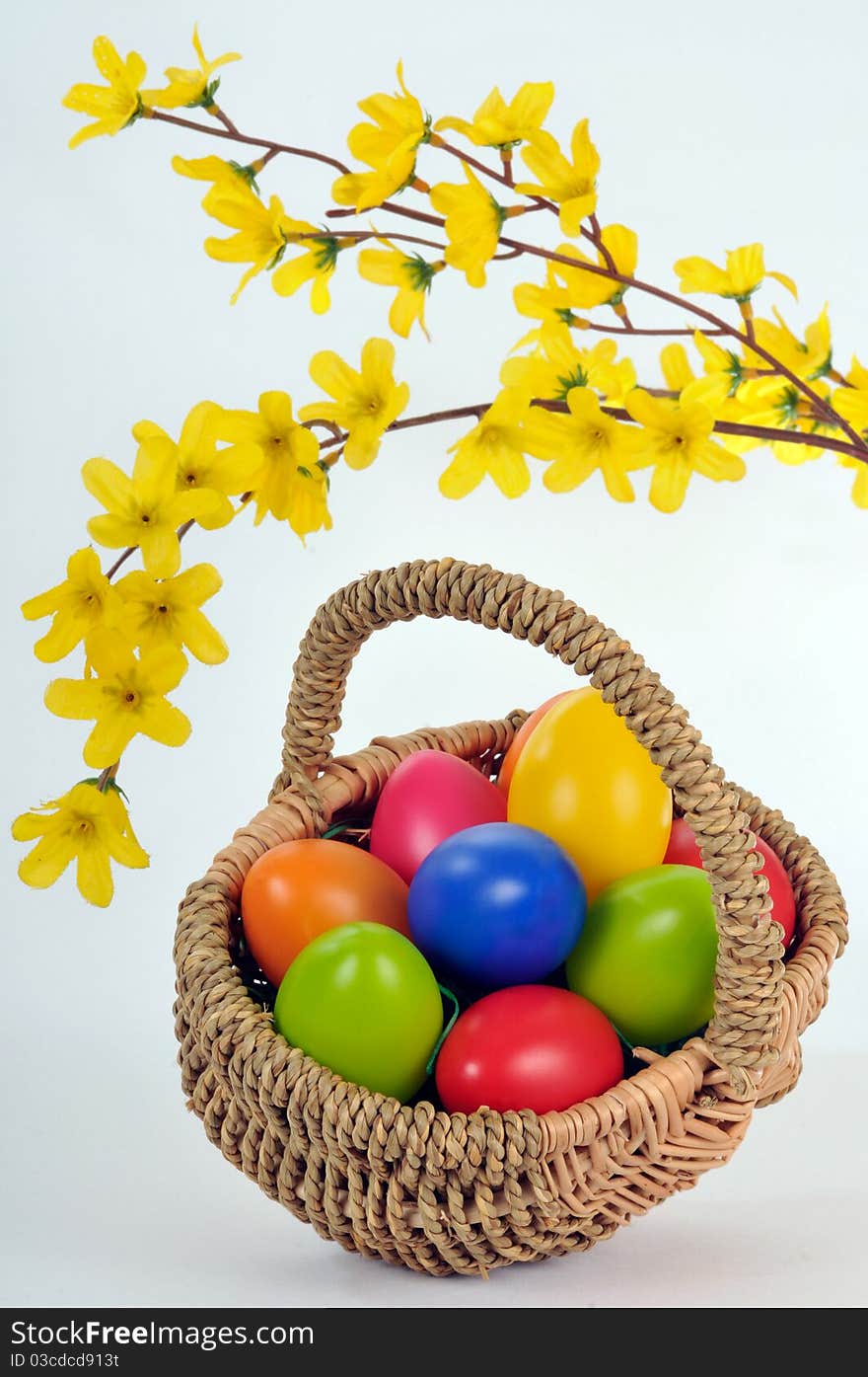 Easter basket with colored eggs