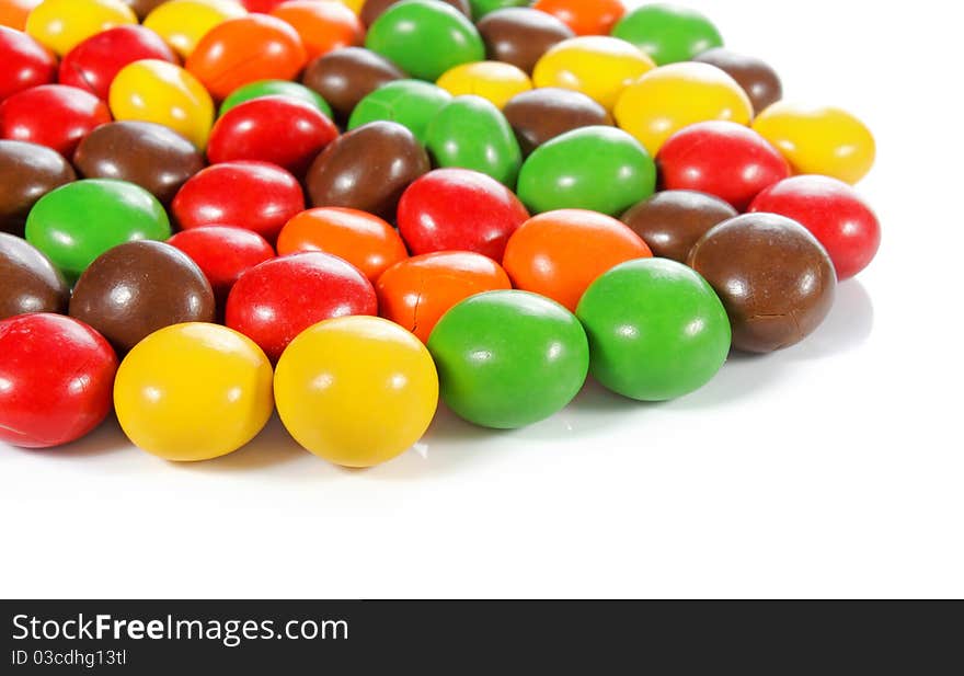 Close up of colorful chocolate candy isolated on white background