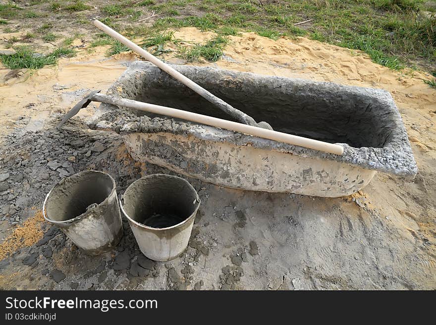 Bath and buckets for mixing mortar. Bath and buckets for mixing mortar