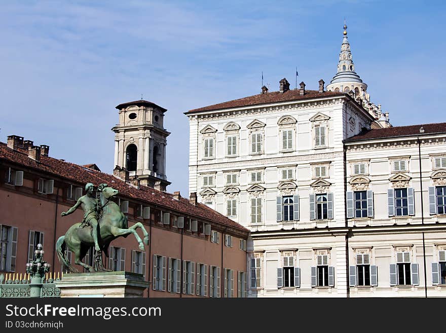 Piazza Castello (Castle Square) in Turin, Italy with a statue of a man on a horse. Piazza Castello (Castle Square) in Turin, Italy with a statue of a man on a horse.