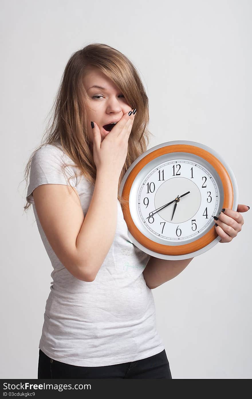 Sleeping Girl With A Big Clock In His Hands