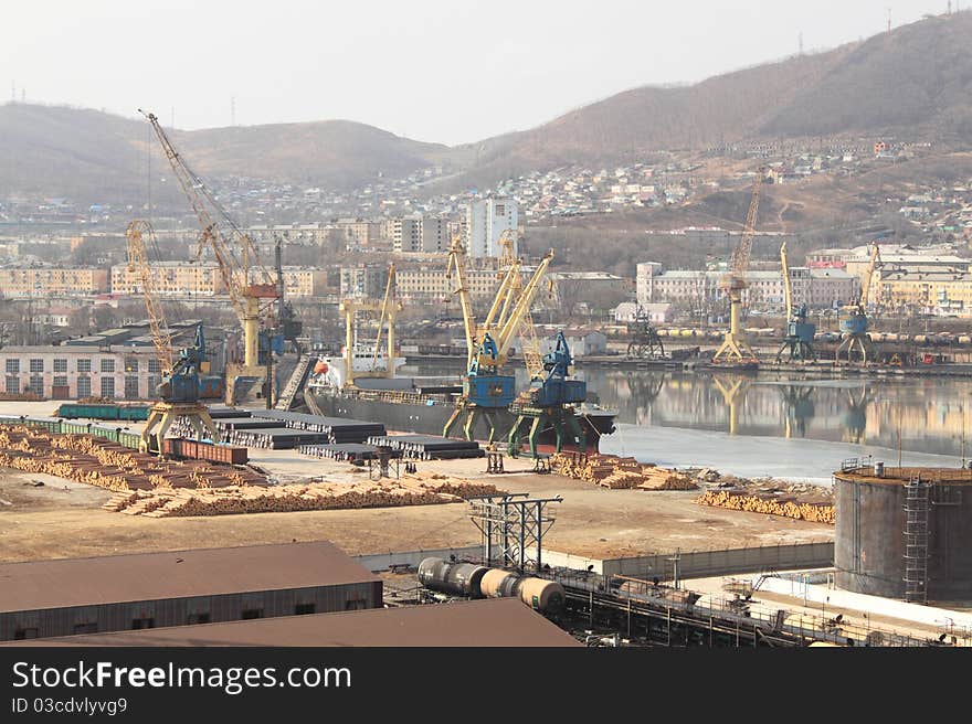 Steamship under loading in Russian small town