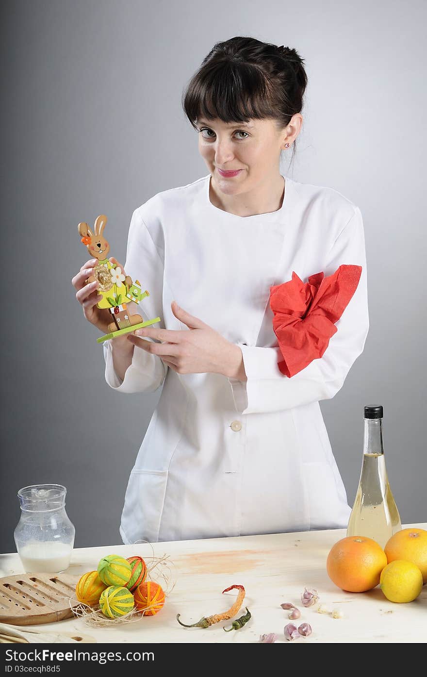 Young woman presenting easter decorations. Young woman presenting easter decorations