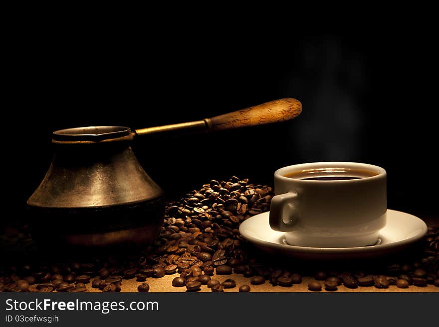 Beautiful coffee still-life on a black background