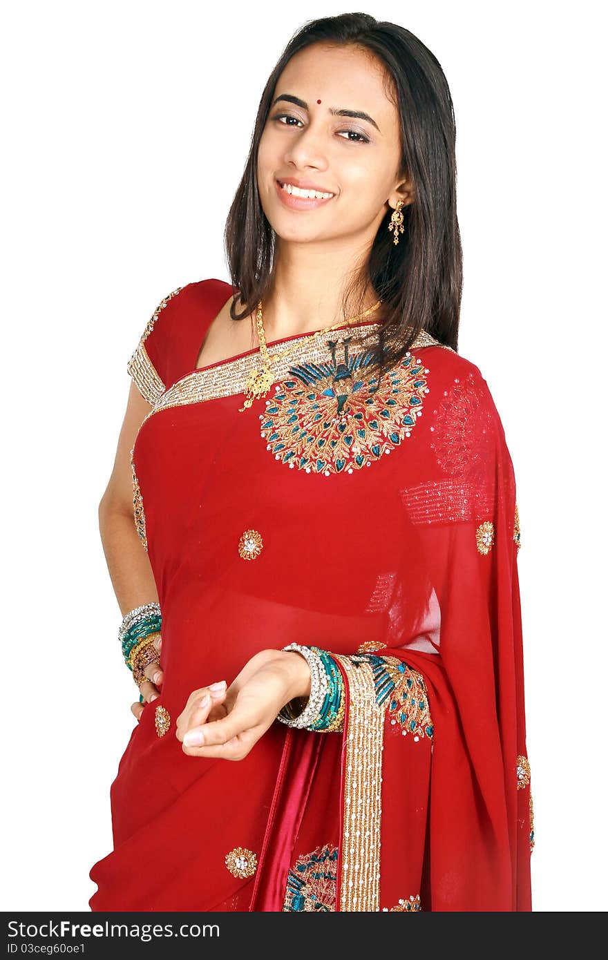 Young Indian girl in traditional clothing. Isolated on a white background.