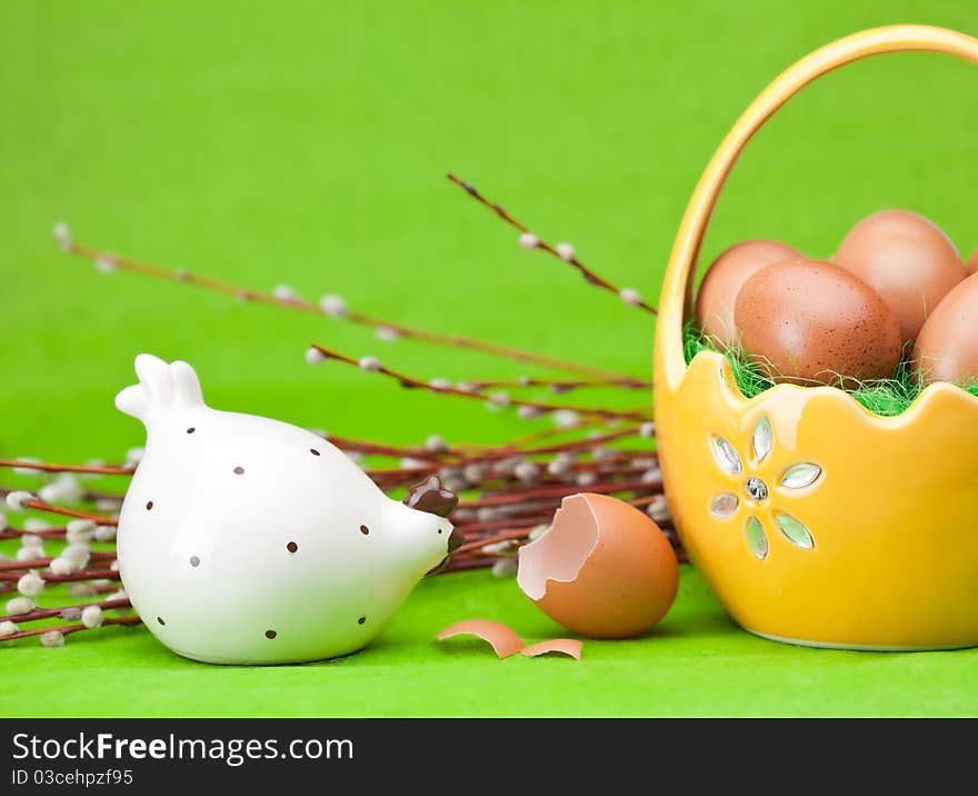 Basket full of Easter eggs with chicken