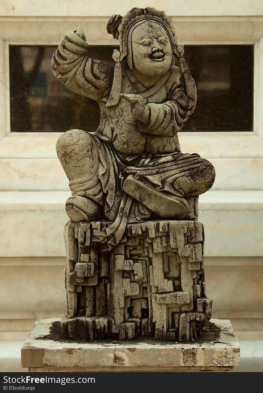 Ancient chinese sculpture in a temple of thailand