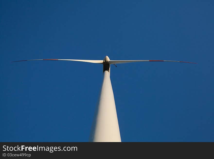 Wind turbine - blue sky - view from below