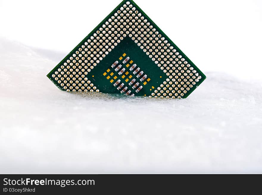 Processor in ice on white background