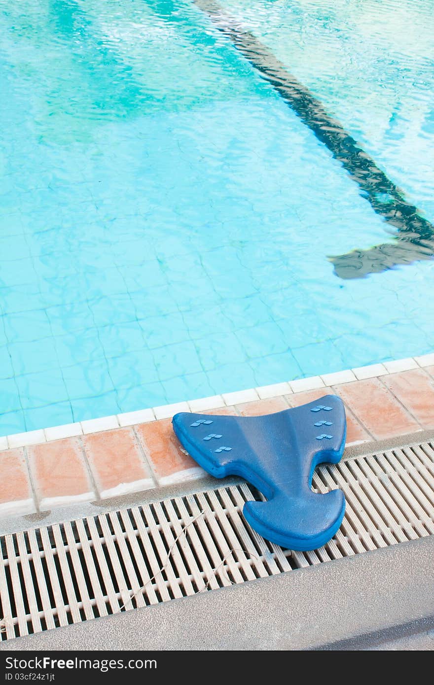 Learn to swim equipment blue Located along the edge of the pool. Learn to swim equipment blue Located along the edge of the pool.