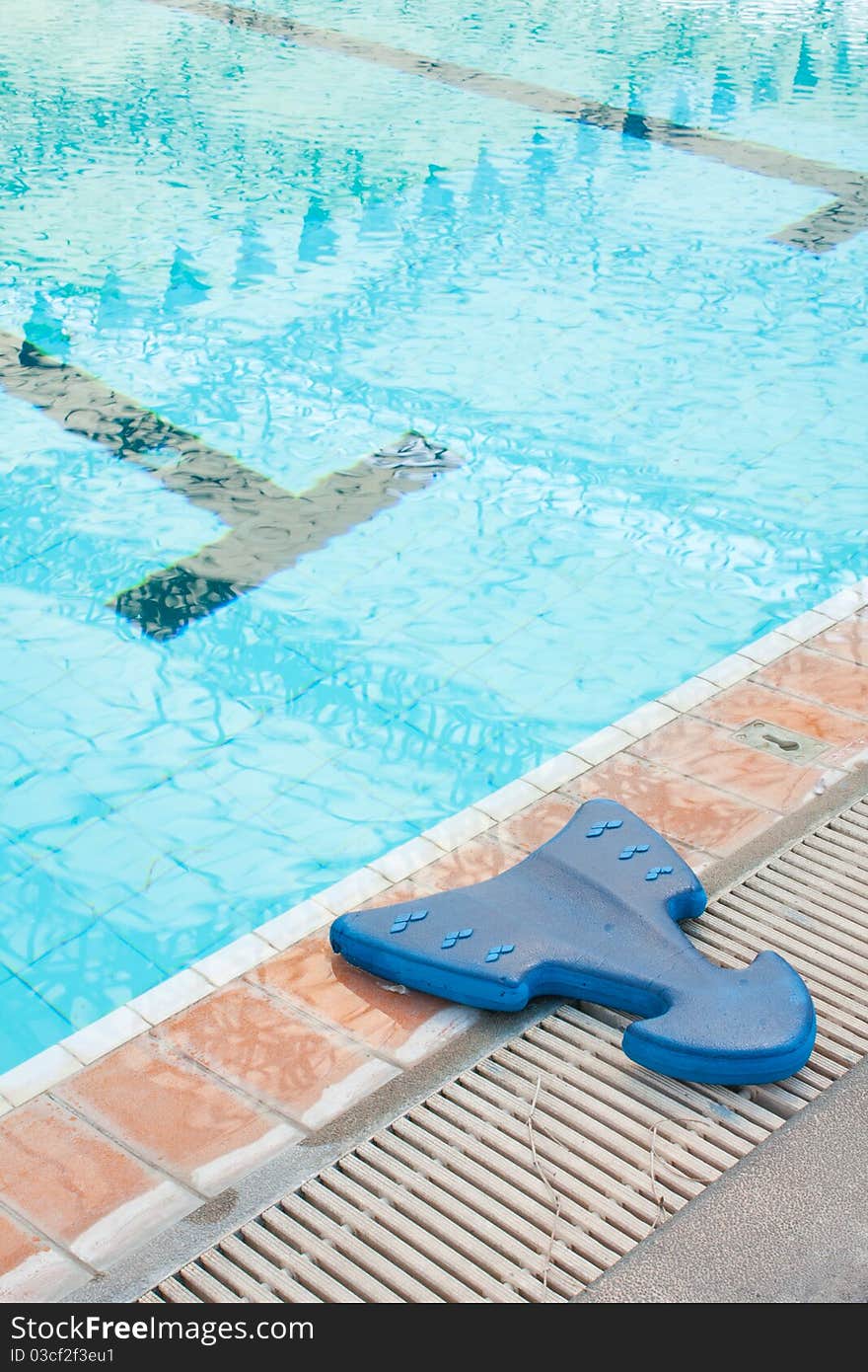 Learn to swim equipment blue Located along the edge of the pool. Learn to swim equipment blue Located along the edge of the pool.