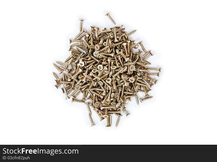 Many small brass self-atack screws isolated