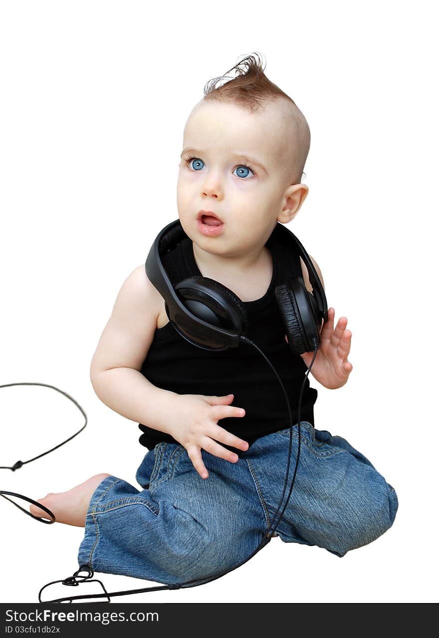 Portrait of serious baby in the earphones. Portrait of serious baby in the earphones