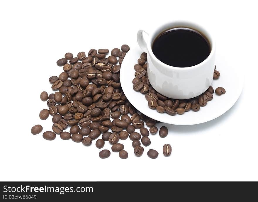 A cup of coffee with beans