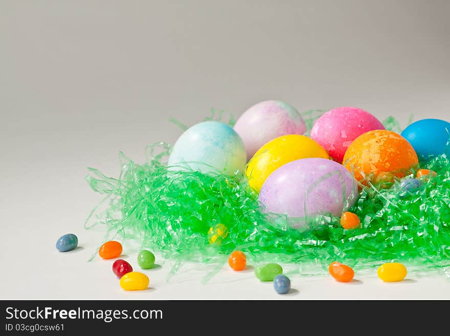 Brightly Decorated Easter Eggs And Jelly Beans