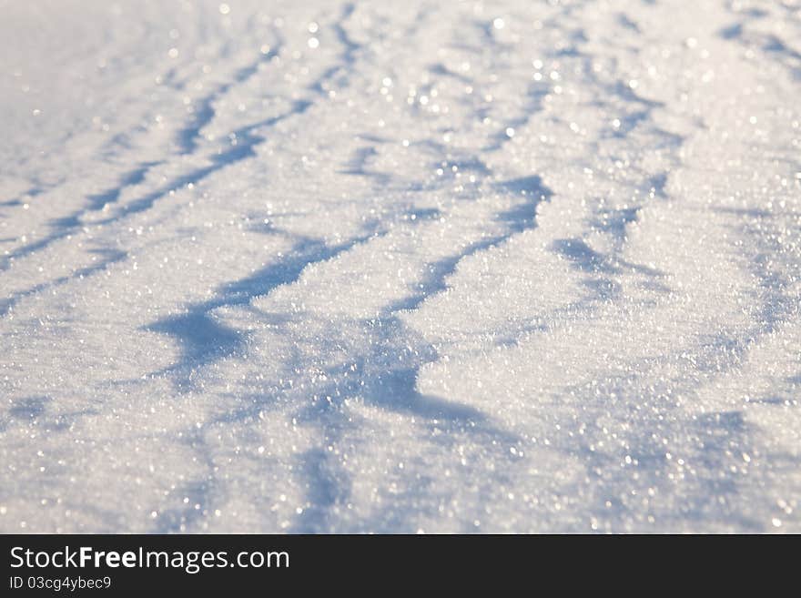 Snow shining on the rising sun.