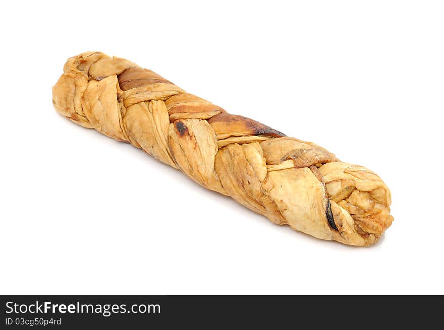 A braided dried melon isolated on a white background