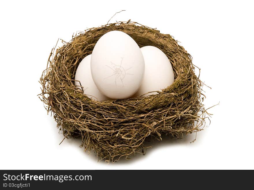 Group of eggs where the top one has a crack. Isolated. Studio shot. This is one bad egg in a group of three. Group of eggs where the top one has a crack. Isolated. Studio shot. This is one bad egg in a group of three.