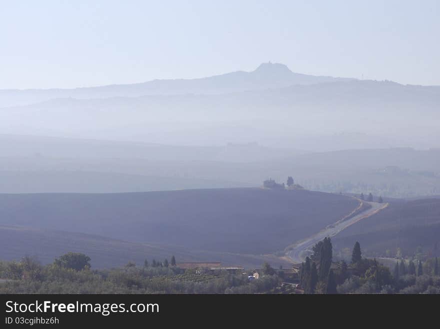 Dew over early morning Tuscan landscape. Dew over early morning Tuscan landscape