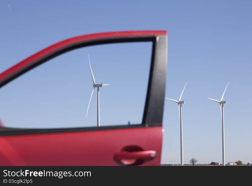 Green energy through the window of a gasoline car