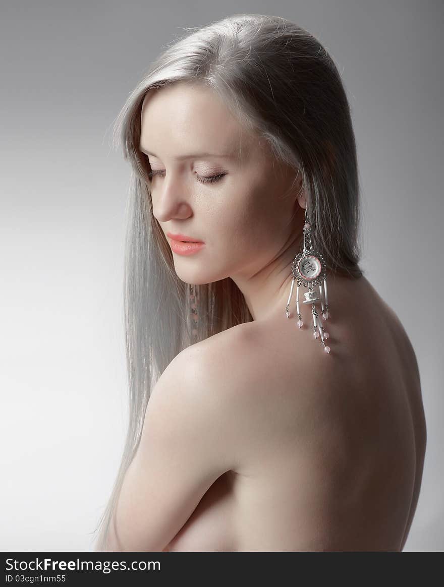 Sexy naked woman with jeweller decor