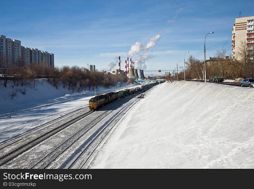 Cargo train in city landscape