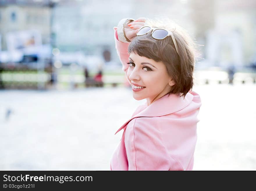 Portrait of beautiful woman smiling outdoors