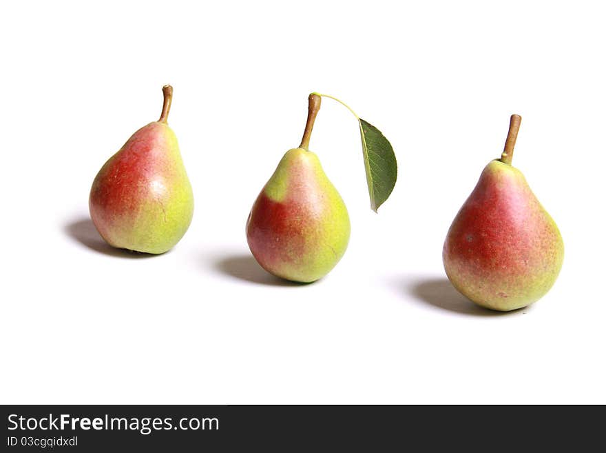 Ripe pear with shadow isolated on white background