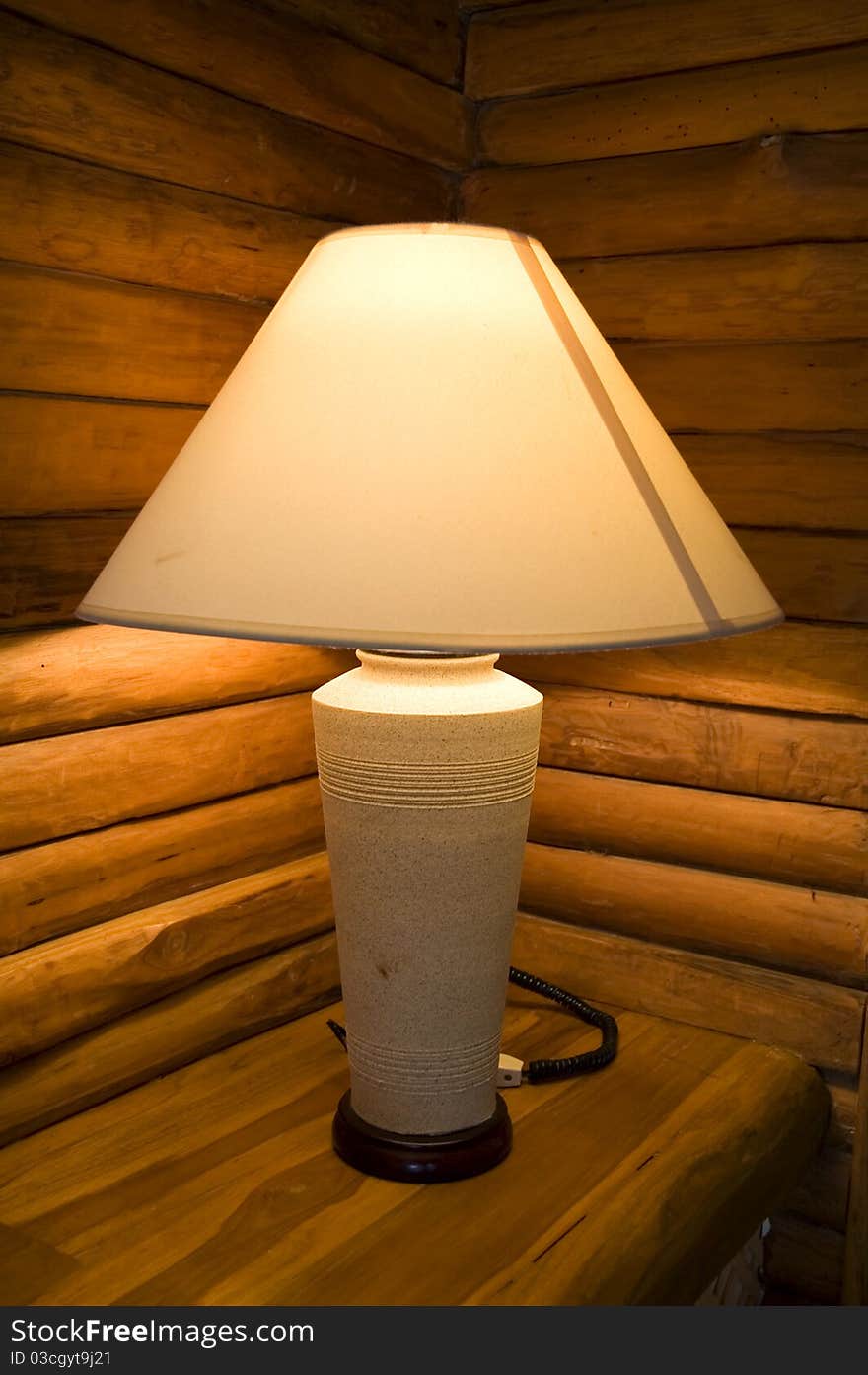 Lamp with wooden background