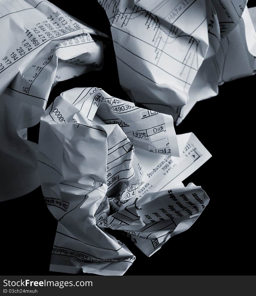 Crumpled financial documents