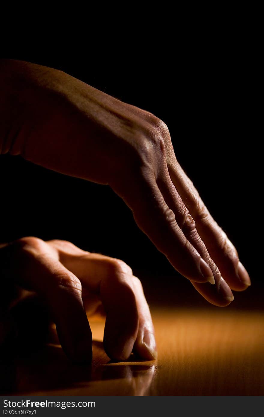 Woman's hand on the table