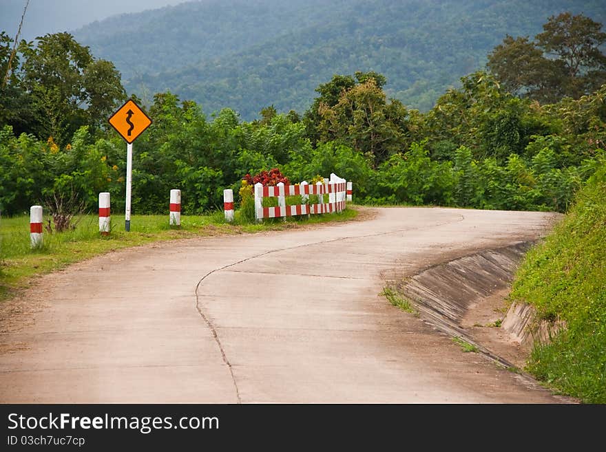 Curve sign for curve road on mountain. Curve sign for curve road on mountain