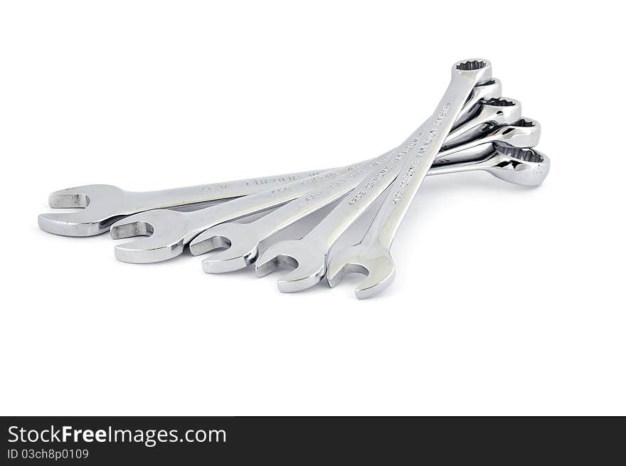 Set of wrenches on white background