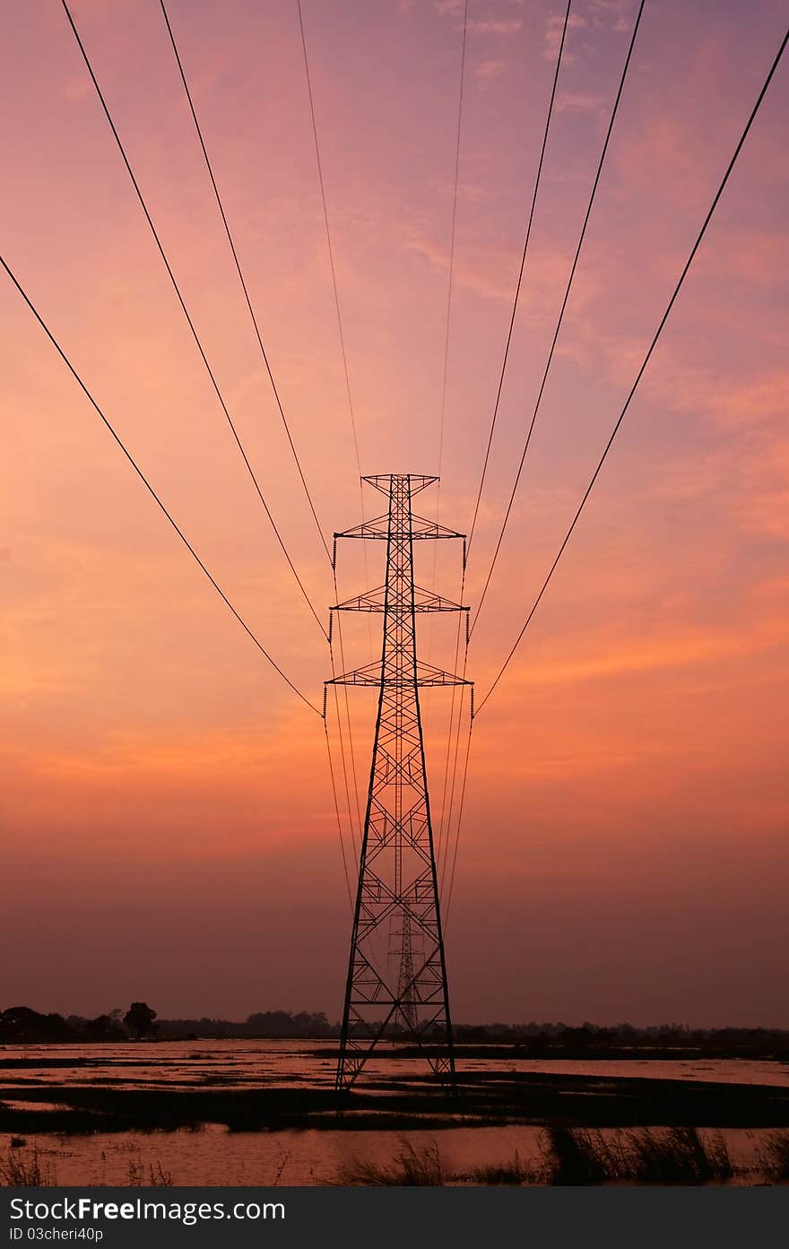 High voltage pole on sunset blackground