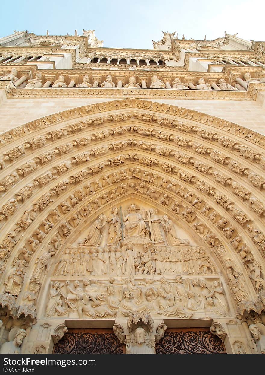 Gothic sculptures of saints in the facade of Notre Dame de Paris cathedral. Antique filter and vignetting in Paris , France. Gothic sculptures of saints in the facade of Notre Dame de Paris cathedral. Antique filter and vignetting in Paris , France