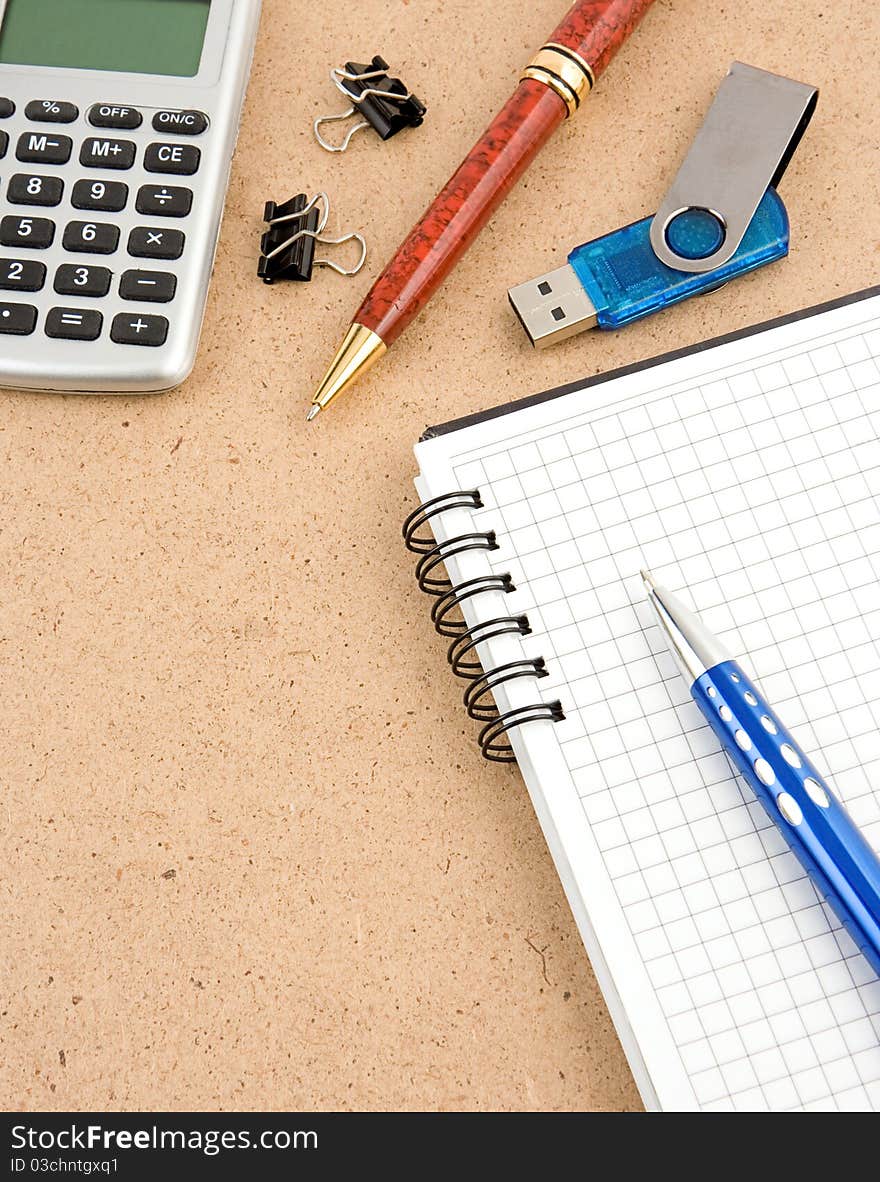 School and office accessories on wooden table