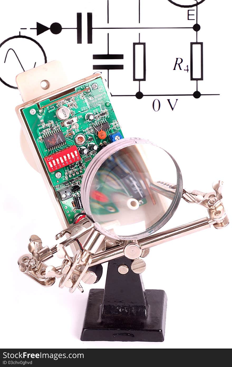 Circuit board under a magnify glass