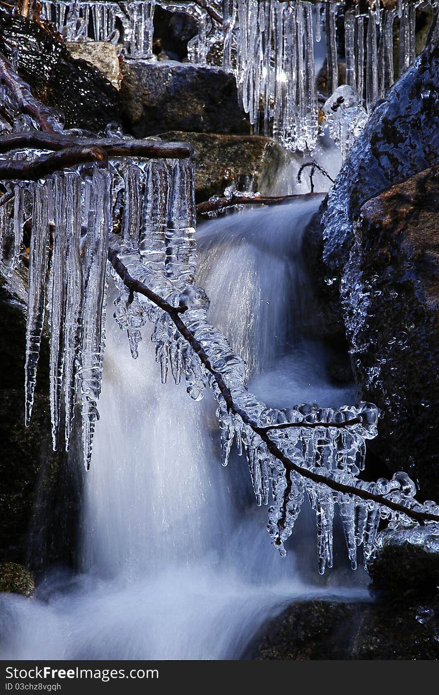 View of a small frozen waterfall in Slovakia. View of a small frozen waterfall in Slovakia