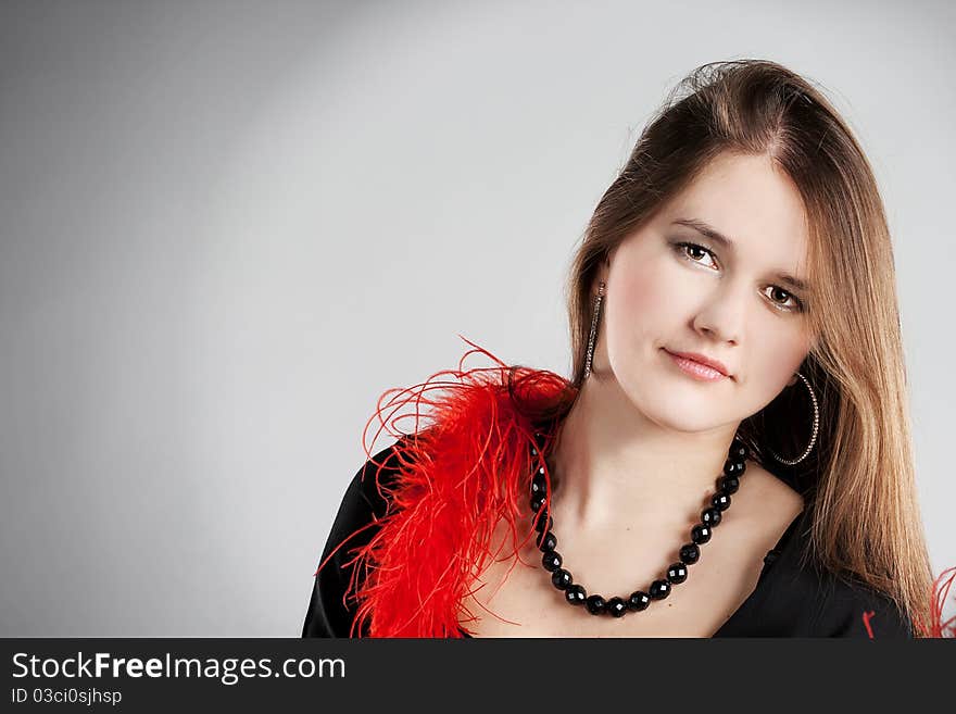 Attractive girl closeup portrait on grey background. Attractive girl closeup portrait on grey background