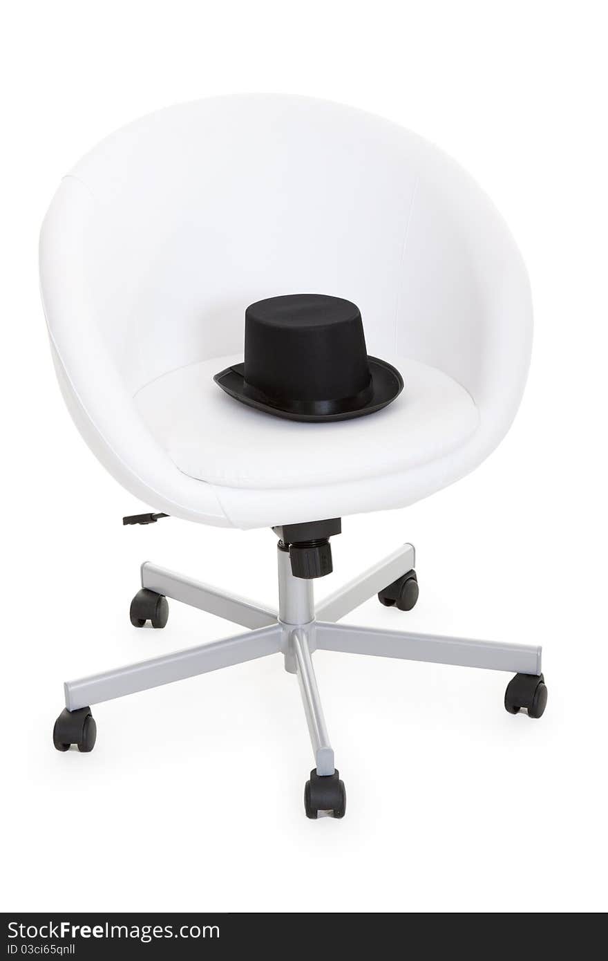 Black slouch hat is a white leather armchairs. Black slouch hat is a white leather armchairs