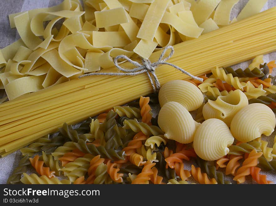 Various types of pasta - spachetti, fusilli, lumaconi