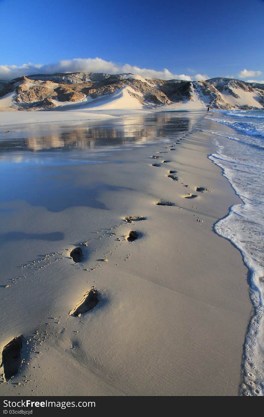 Beatiful beach with footprints in the sand. Beatiful beach with footprints in the sand