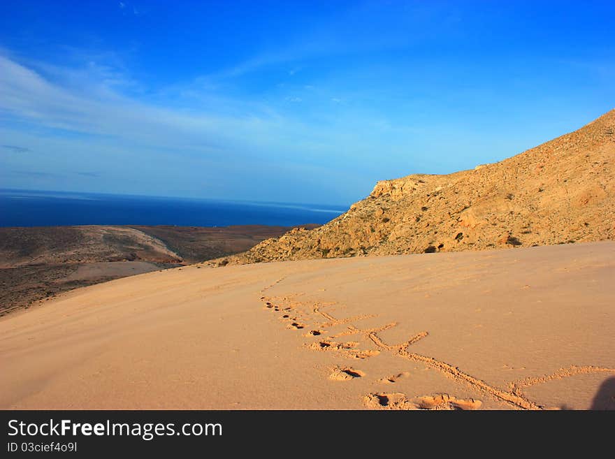 Scenic view to socotra island with blue sky and ocean