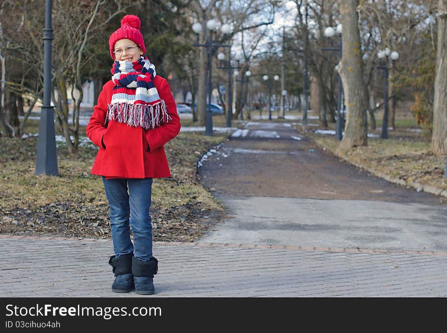 Pretty girl on a walk in the Spring Park