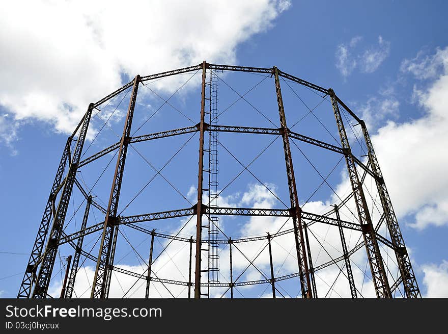 A Gasometer Against A Blue Sky