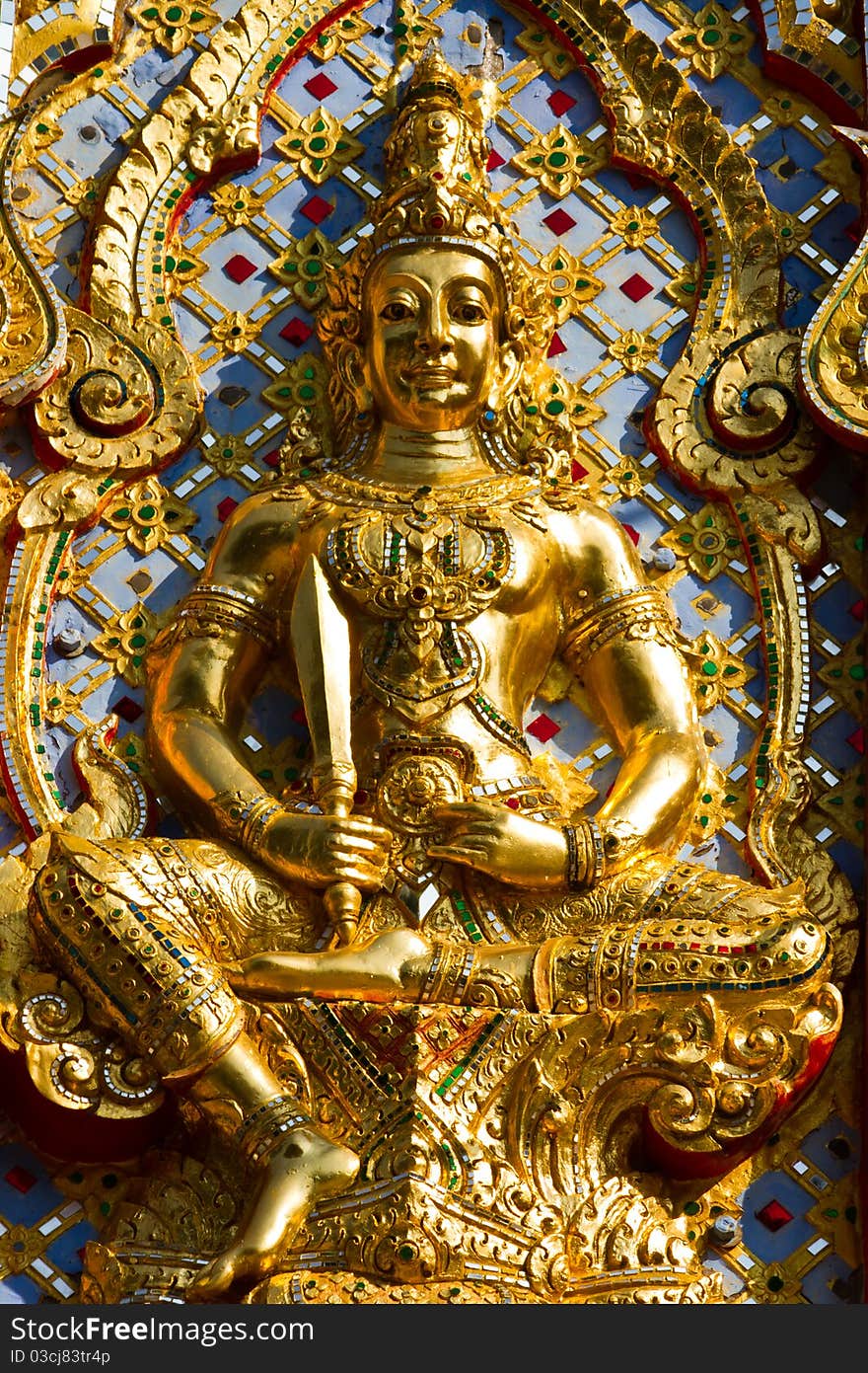 The golden religious statue